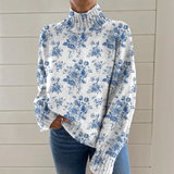 https://cdn.shopify.com/s/files/1/1057/5383/7908/files/mollie-may-blue-botanical-roll-neck-jumper.png?v=1789123526
