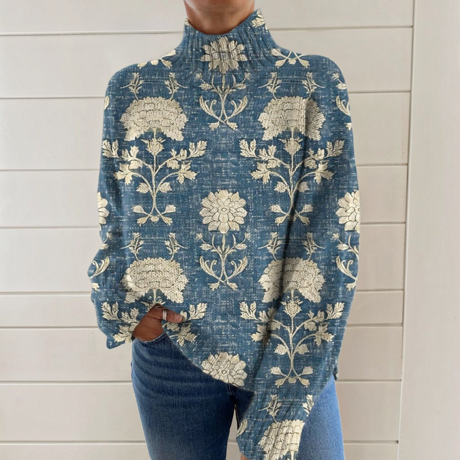 https://cdn.shopify.com/s/files/1/1057/5383/7908/files/mollie-may-blue-floral-roll-neck-jumper.png?v=1789123529