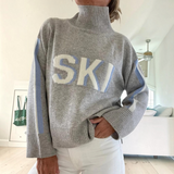 https://cdn.shopify.com/s/files/1/1057/5383/7908/files/mollie-may-grey-ski-roll-neck-jumper.png?v=1789123521