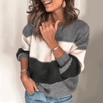 https://cdn.shopify.com/s/files/1/1037/6196/9489/files/neriza-trui-or-losse-strepen-trui-voor-vrouwen-carla-moda-1.png?v=1788379734