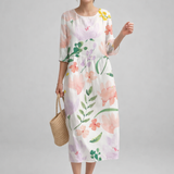 https://cdn.shopify.com/s/files/1/1037/6196/9489/files/polish-model-posed-floral-midi-dress-european-fashion-studio-full-length.png?v=1781357877