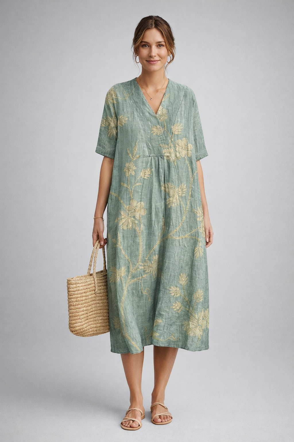https://cdn.shopify.com/s/files/1/1037/6196/9489/files/polish-model-posed-studio-shot-sage-green-floral-linen-midi-dress-full-bod.png?v=1783845543