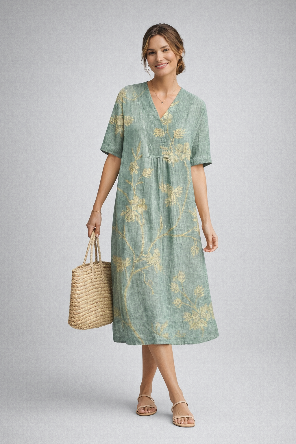 https://cdn.shopify.com/s/files/1/1037/6196/9489/files/polish-model-posed-studio-shot-sage-green-floral-linen-midi-dress-full-body.png?v=1783845542