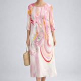 https://cdn.shopify.com/s/files/1/1037/6196/9489/files/polish-model-studio-posed-abstract-pink-midi-dress-full-body-catalog-shot.png?v=1781357877