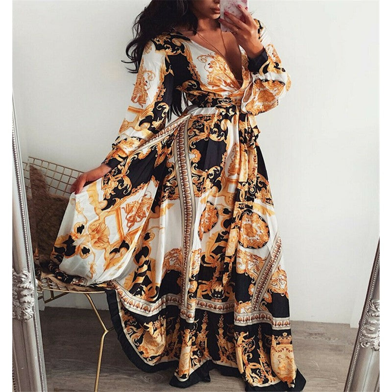 https://cdn.shopify.com/s/files/1/1057/5383/7908/files/wikkeljurk-zomerjurk-voor-dames-met-split-en-v-hals-cara-camilla-1021.jpg?v=1785188029