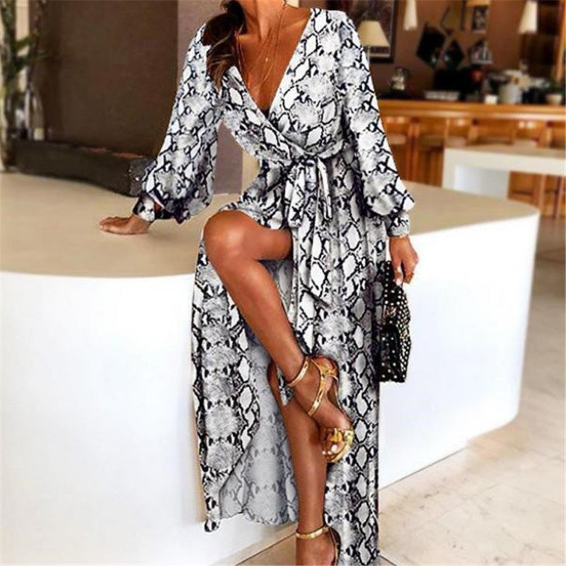 https://cdn.shopify.com/s/files/1/1057/5383/7908/files/wikkeljurk-zomerjurk-voor-dames-met-split-en-v-hals-cara-camilla-1025.jpg?v=1785188029